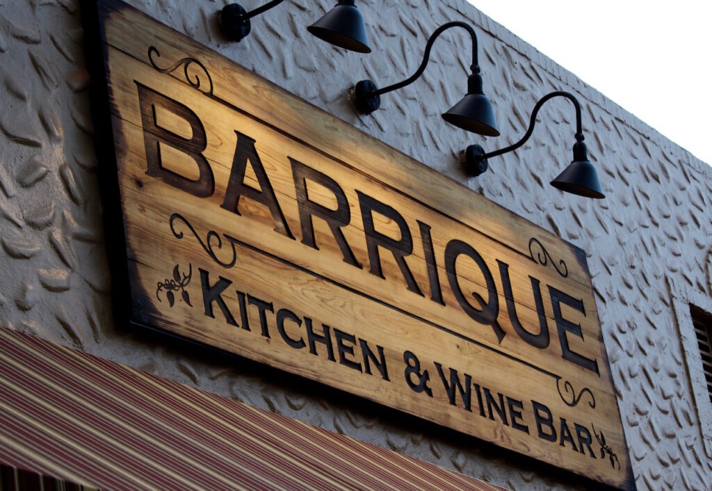 Wooden Sign on Building 