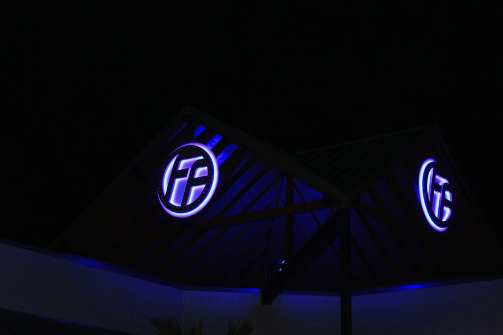 Signs lit up at night